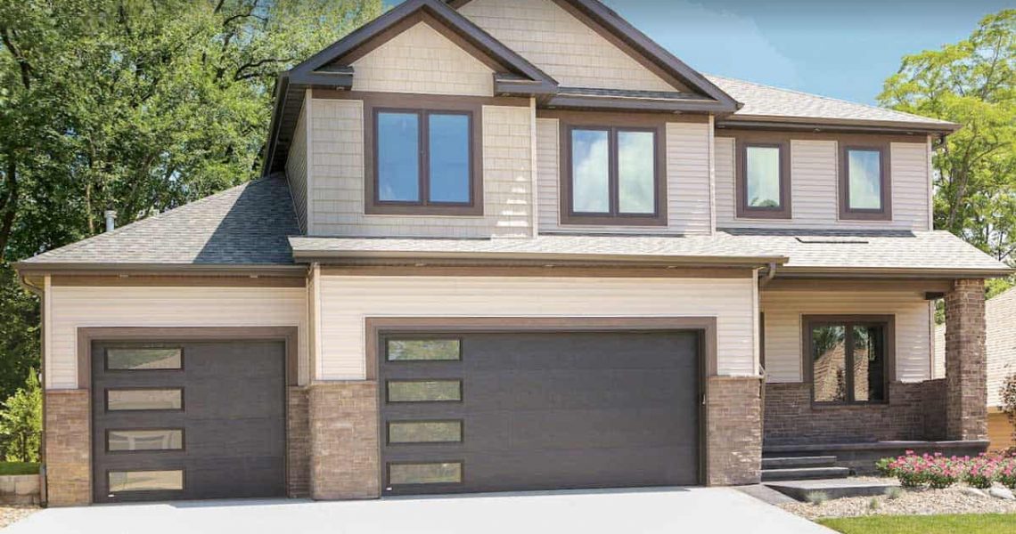 modern garage door with mirrors on large house